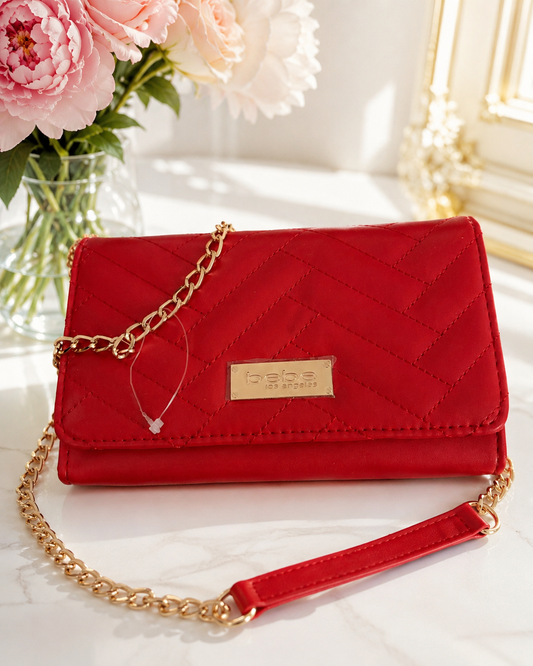 ✨❤️ New Arrival Alert! ❤️✨
        LIMITED EDITION:
Meet your new favorite statement bag! This gorgeous red quilted crossbody combines style, elegance, and convenience all in one. Featuring luxurious gold-tone hardware, multiple compartments.